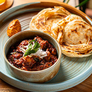 Chicken Pepper Fry, Malabar Parotta, Tomato Chutney