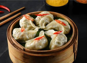 Chicken Steam Momos (6pcs.)..