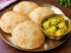 Luchi With Sada Aloo Tarakari