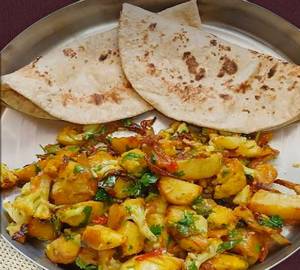 Green Potato bhaji with 4 home made soft jawar roti