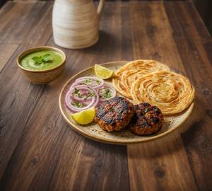 Veg kabab 2 Paratha 2 onion green chutney