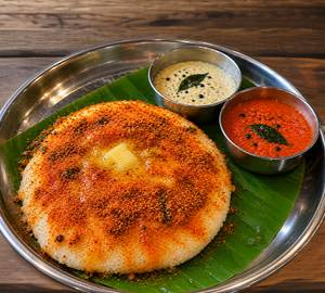 Butter Puri Thatte Idli (1p) + coconut and tomato chutney 