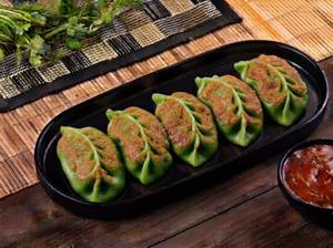 Veg Spl Fried Momos [ 5 psc ]