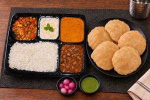 Matar Paneer + Mix veg + Chole + Raita + Poori (5pcs) + Rice