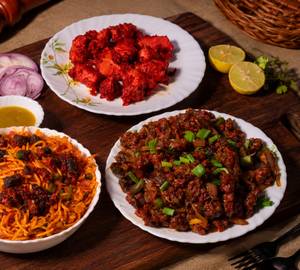 Chicken fried rice and chilly chicken and chicken pakoda