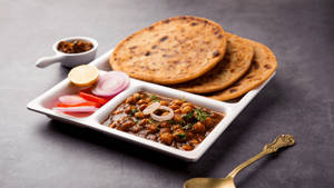 Aloo Cheese Paratha With Chole And Buttermilk