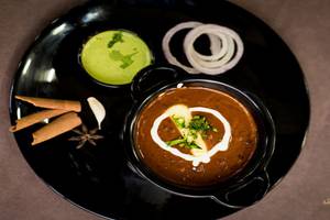 Dal Makhni + 2 Butter Naan + Coke 200 Ml