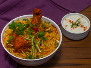 Chicken Biryani +raita (for 2)