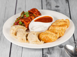 Chicken Triple Momos (9 Pieces)