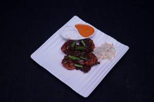 Chicken Momos In Chilli Sauce[6 Pieces]