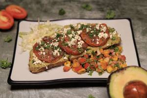 Avacado Toast With Grilled Tomato