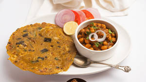 Aloo Onion Paratha With Chole And Buttermilk