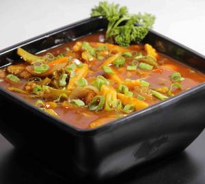 Baby Corn Mushrooms And Broccoli In Schezwan Sauce