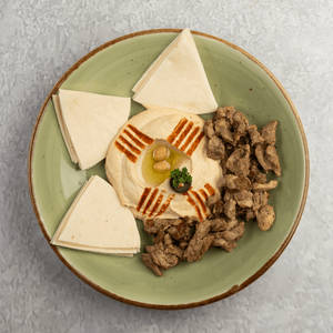 Lebanese Chicken On Hummus Served With Pita