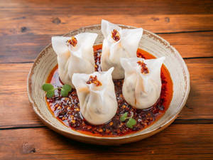 Chilly Oil Exotic Vegetable Cheese Dumplings