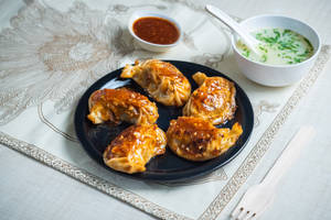 Chicken and cheese momo pan fry in korean sauce