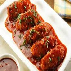 Veg Darjeeling Pan Fried Momo in Schezwan Gravy