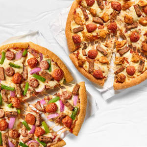 Super Value Deal : 2 Medium Non -Veg Pizzas starting at Rs 749