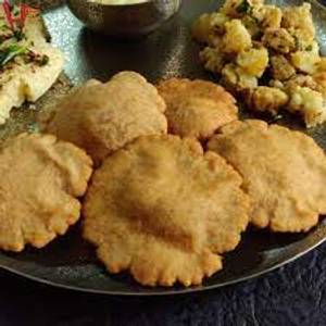 Combo 5 (02 Poori Singahara Atta With Gravy Sabji)                                           