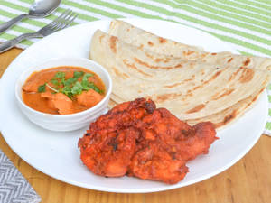 Kerala Parotta (2pc) + Chicken Kebab (4pc) + Chicken Masala[serves 1]