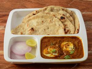 Egg Curry [2 Eggs ] + 2 Butter Roti + Salad