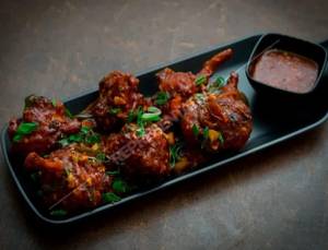 Chicken Schezwan Lolly Pop