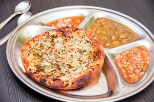 Onion Kulcha Thali(One Piece of Onion Kulcha Served with Aloo Chana Palak and Salad, Pickle, Mouth Freshener)            