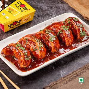 Veg Hot Garlic Pan Fried Momo in Schezwan Sauce (Spicy)