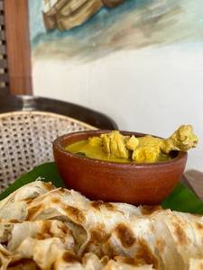 Kerala Parotta With Malabar Chicken Curry