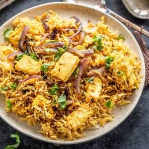 Veg Biryani+raita+panner Gravy