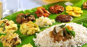 Kerala Meals ( Rice, + Sambar + Moorukari + Fish Gravy + Thoran and achar).