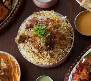 Chicken Biryani Hyderabadi quarter salad chutney gravy