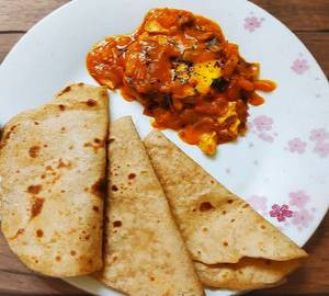 2 Chapati With Egg Tomato Curry [ 250Ml]