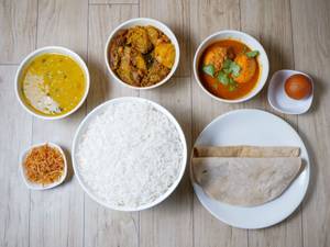 Egg Meal (Rice + Roti (2 Pcs) + Dal + Sabji (Seasonal) + Egg Curry (2 Pcs + 1 Pc Aloo) + Salad + Sweet) (Serves 1)    