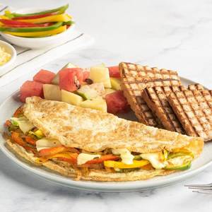 Mexican Omelette And Cut Fruits