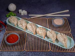 Paneer Fried Momos With Cheese Dip.
