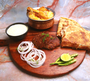 2Pc Shami Kebab + 2Pc Paratha + Half Chicken Biryani