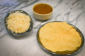 Rasam Glass With Papad