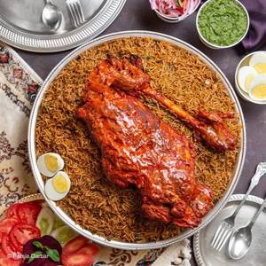 Mutton Raan Tandoori With Kepsa Rice.