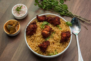 Chicken 65 Biryani(serves with raita)