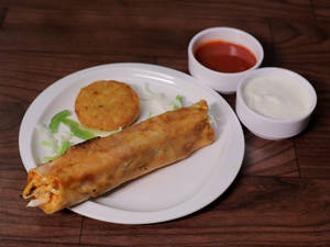 Veg Delight Paneer Frankie [1 pc] [served with Chutney ,Sauce and onions]