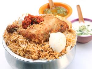 Chicken Biryani (Handi) (Served with Raita & Salad)