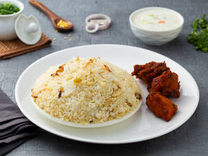 Thalaserry Chicken Biryani + Choice of Starter