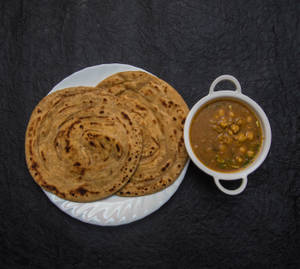 Aloo Paratha(2Pcs)+ Chole + Raita + Aachar