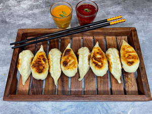 Pan Fried Kothey Corn & Cheese Momo (8 Pcs)