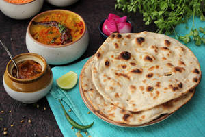 Dal Tadka With Tandoori Roti (2 Pcs)