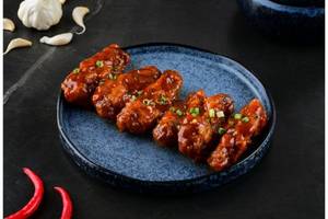 Schezwan Chicken Wings (6 Pcs)