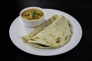 Roasted Tempeh Tikka In Makhani Gravy With Paratha