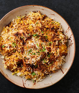 Chicken Tikka Biryani Half (2 Pcs Chicken Boneless Tikka + Raita)