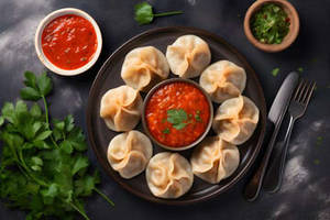 Veg Steamed Momos [8 Pieces] with Special Schezwan Chutney